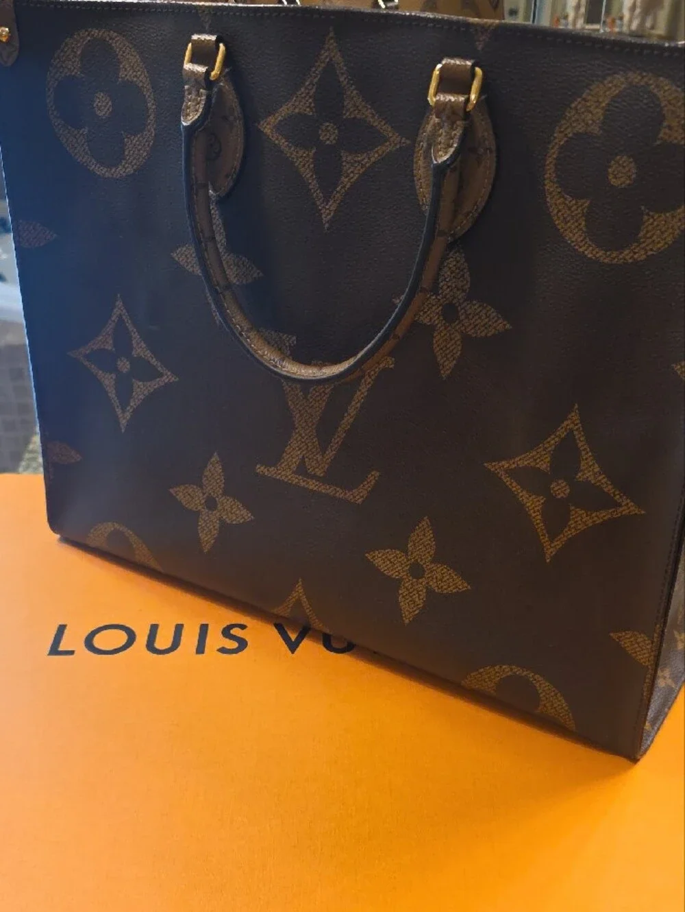 Louis Vuitton Large Monogram Canvas Tote Shoulder Bag in Brown and Tan.